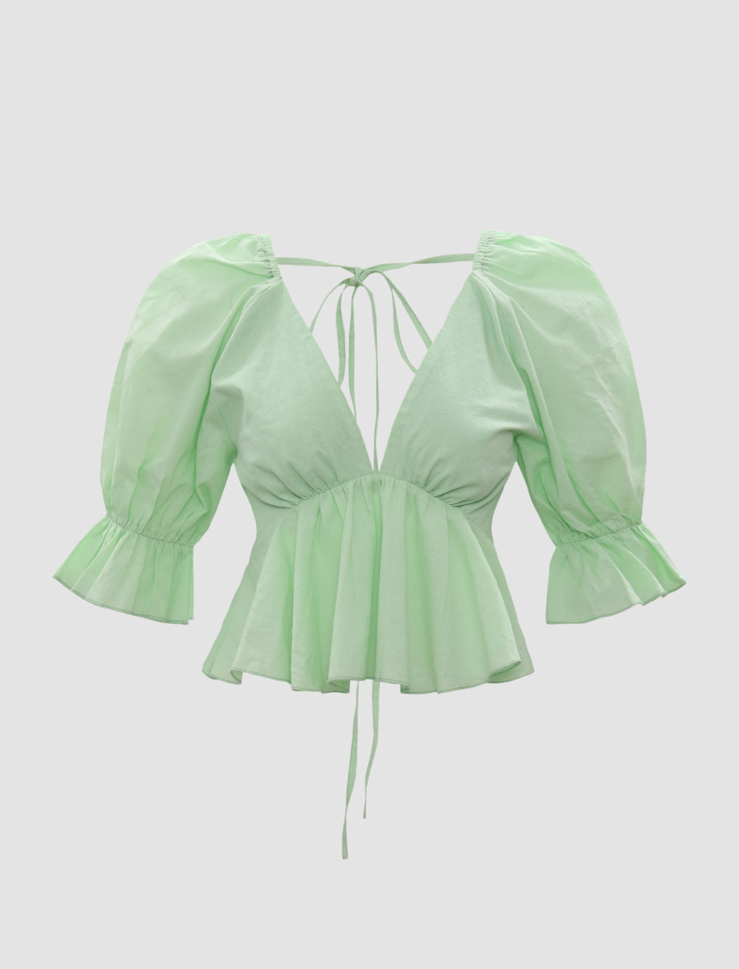 Bluse mit V-Ausschnitt und Puffärmeln