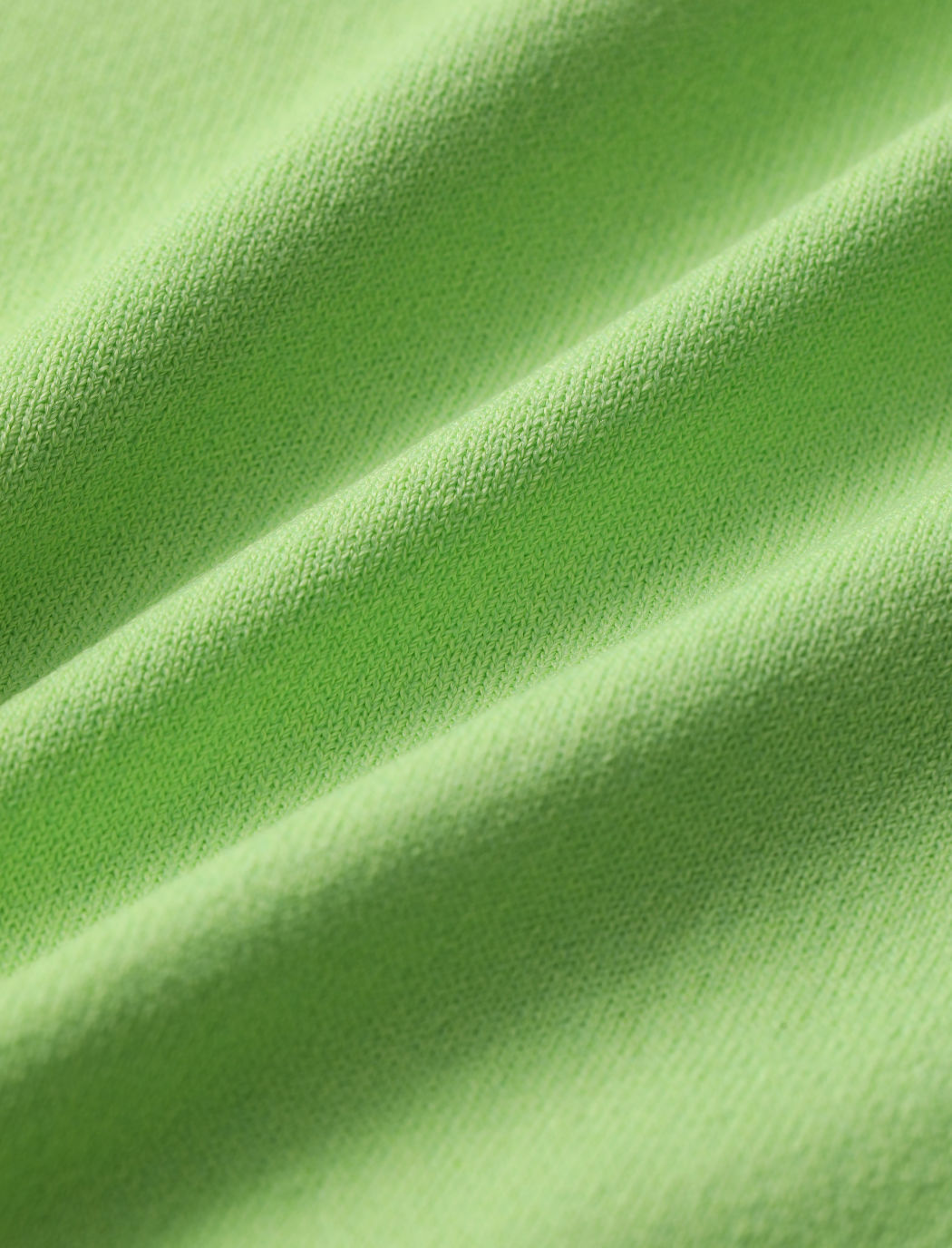 Strickweste mit grünem Umriss