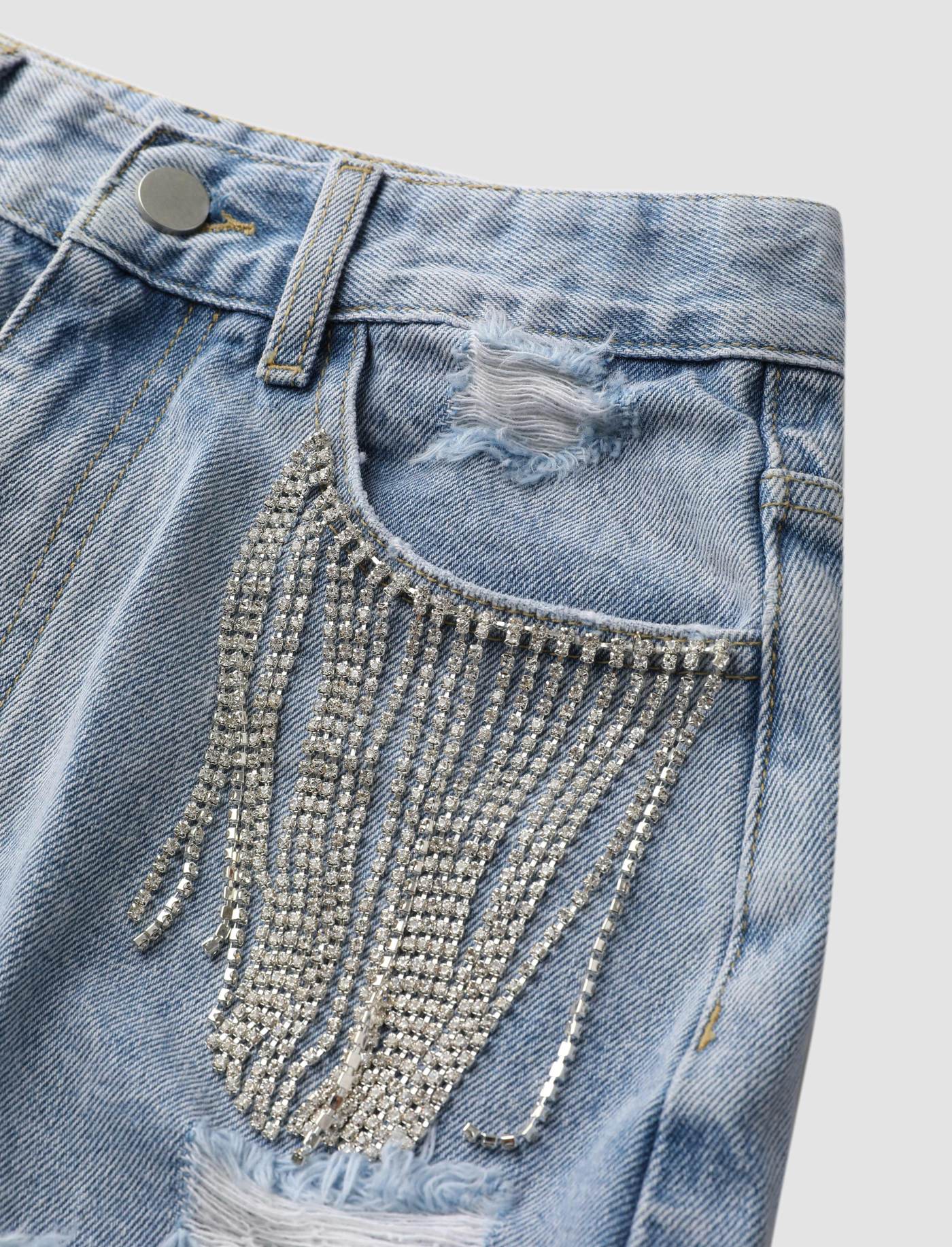 Shorts en jean déchirés à franges diamant
