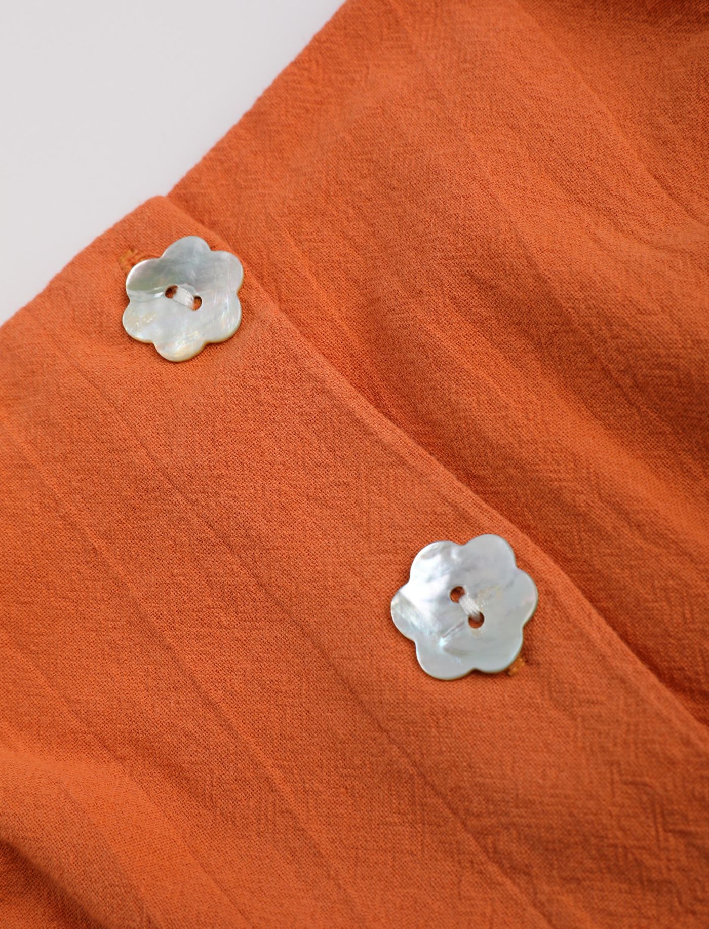 Orange Crop Top mit Blumendetail