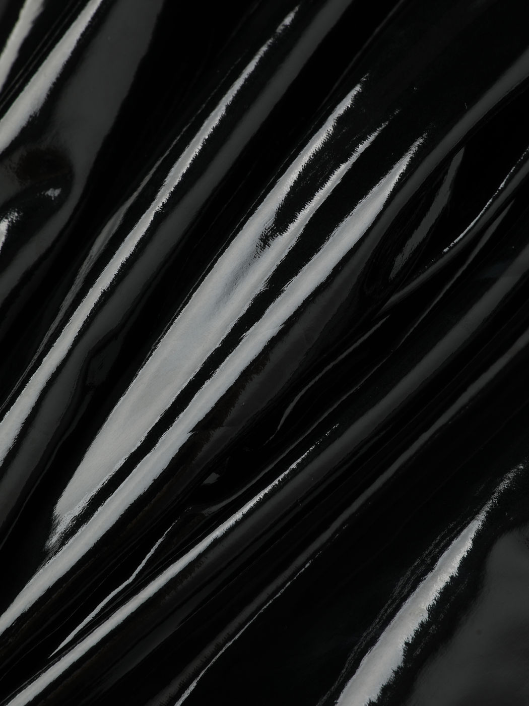 Schwarze Lacklederhose