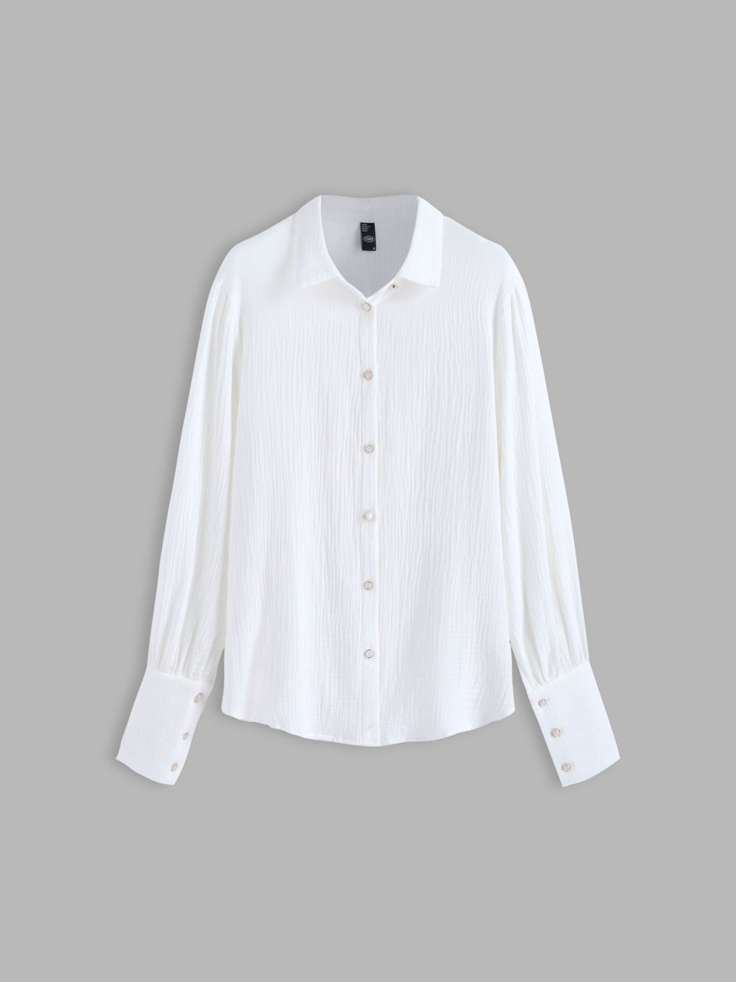 The Essential White Button Down Blouse
