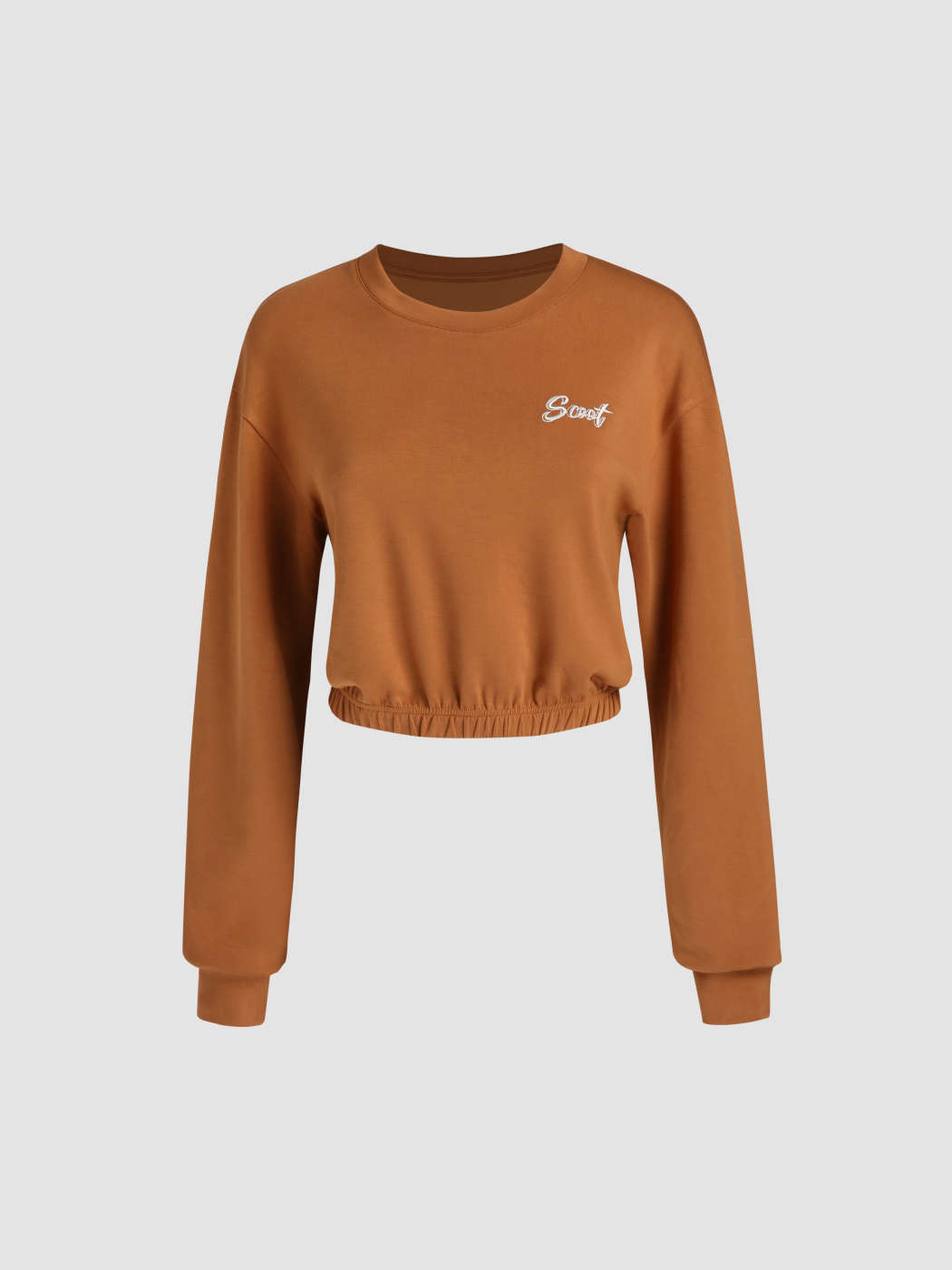 Top corto con letras camel