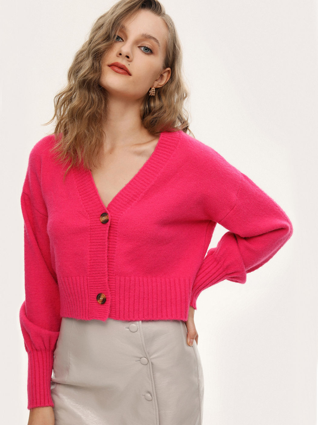 Pinke Strickjacke mit Knöpfen