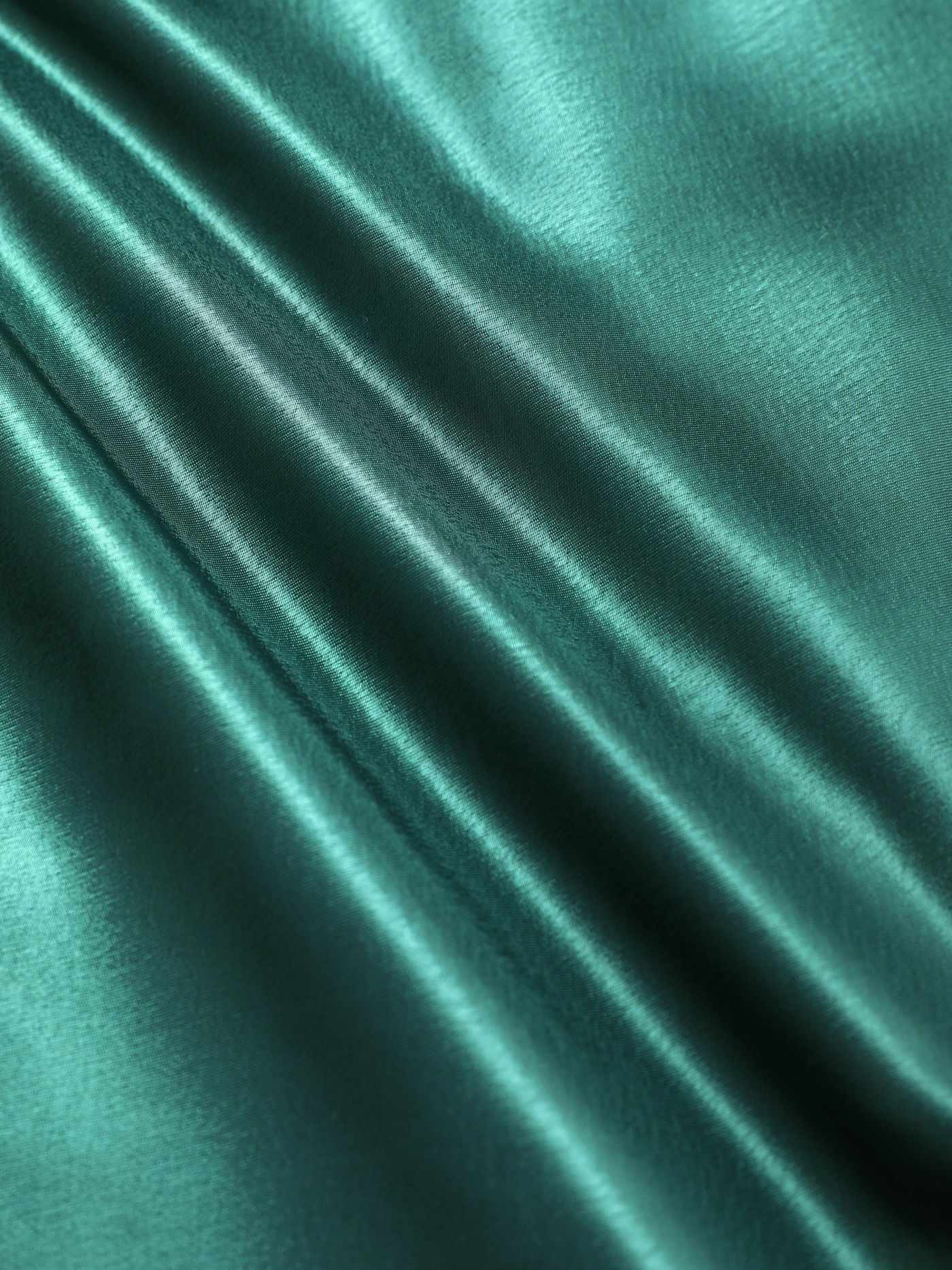 Robe unie à volants et nœud au cou