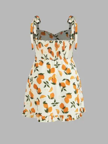 Minivestido con volantes en el bajo y hombros descubiertos con estampado de limones de Curvy