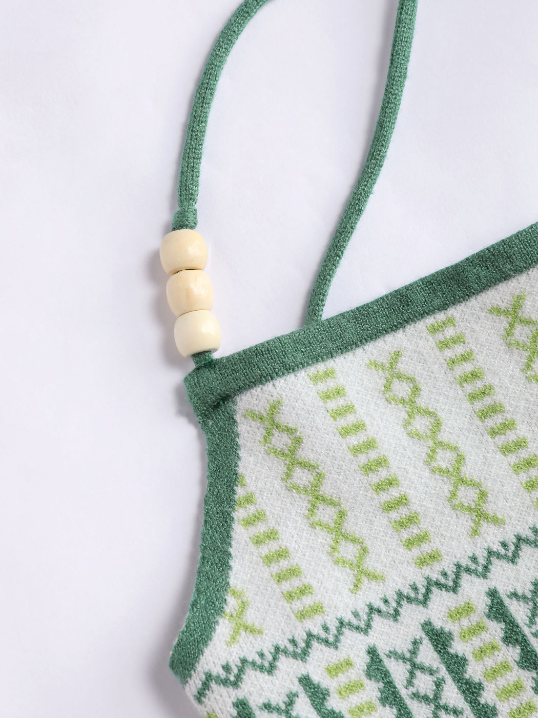 Perlenbesetztes Strickkleid mit Tribal-Rückenbindung