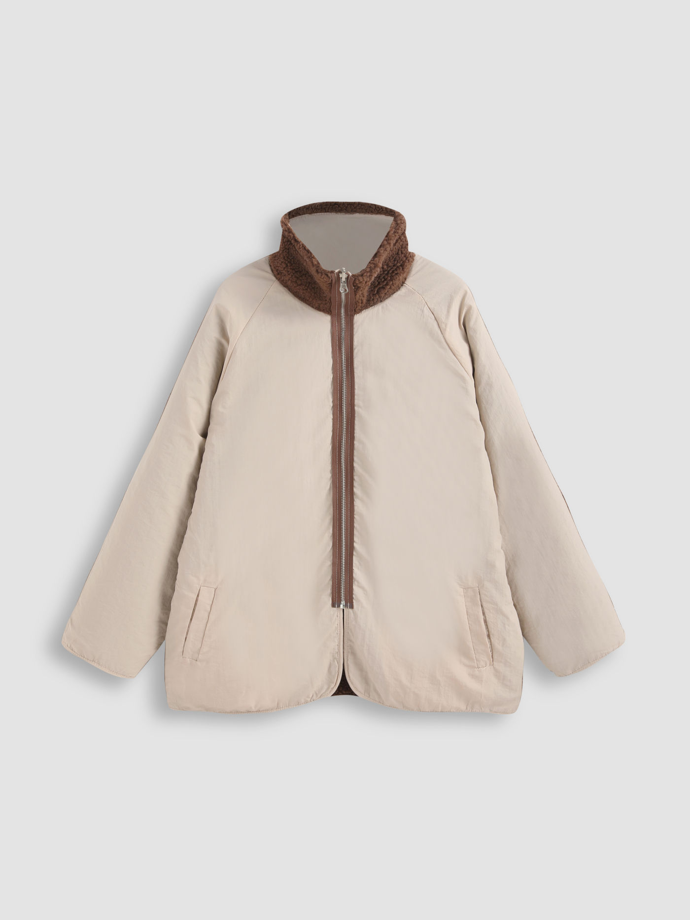 Veste réversible avec poche zippée