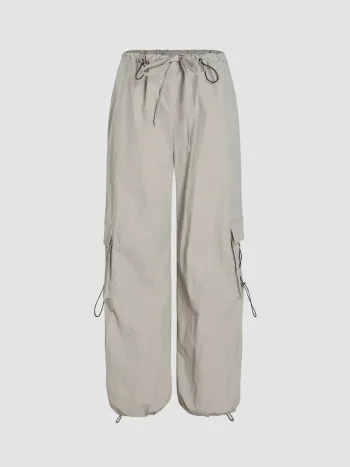 Pantaloni cargo annodati a vita bassa in tinta unita