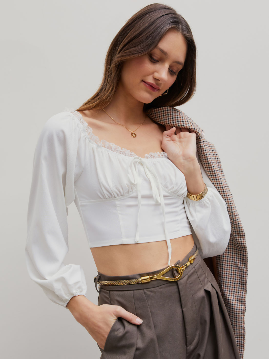 Blusa de manga larga con lazo y encaje