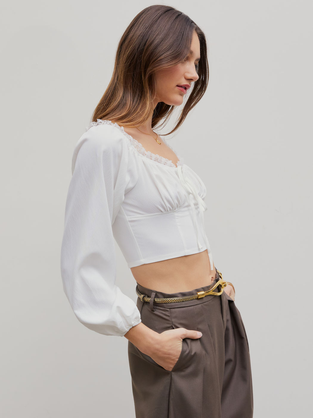 Blusa de manga larga con lazo y encaje