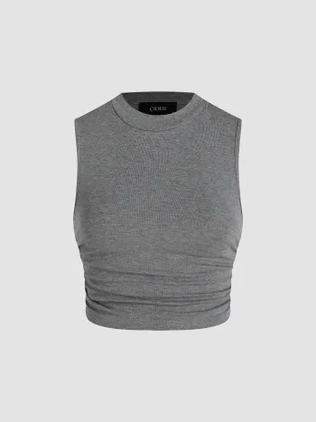 Rundhalsiges einfarbiges ärmelloses geriffeltes Crop Top