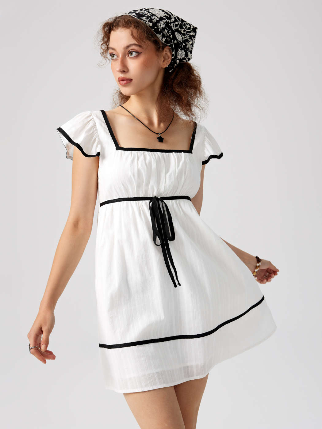 Knotted cutout organic cotton-jacquard mini dress