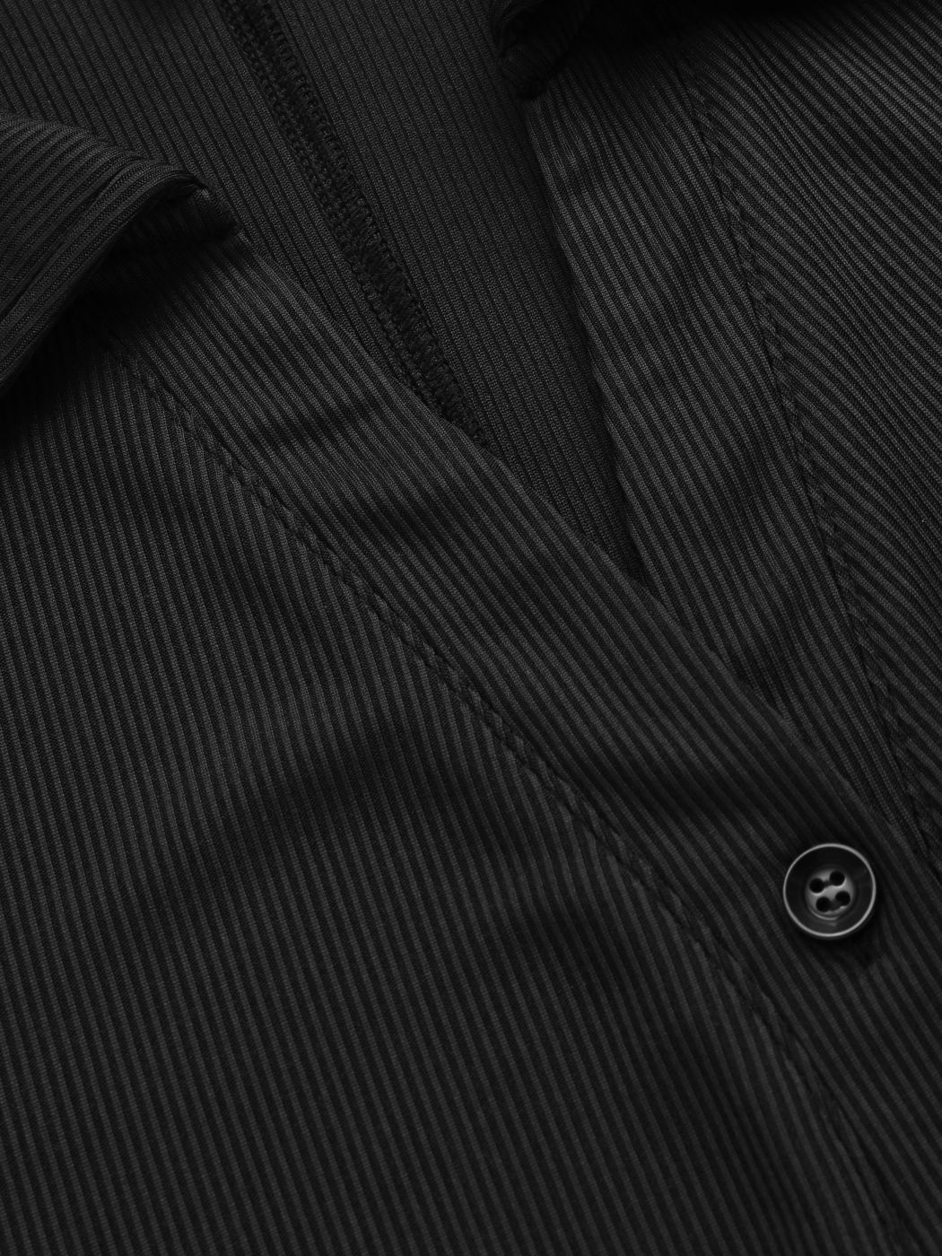 Rippstrick-Strampler mit Knopfleiste Kurve & Plus