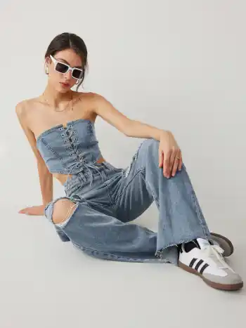 Mid Rise Ripped Straight Leg Jeans