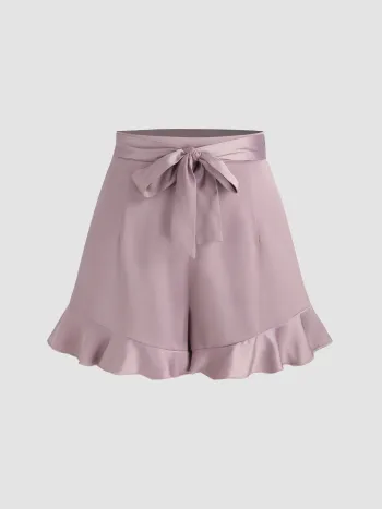 Mini short large en satin taille haute à volants