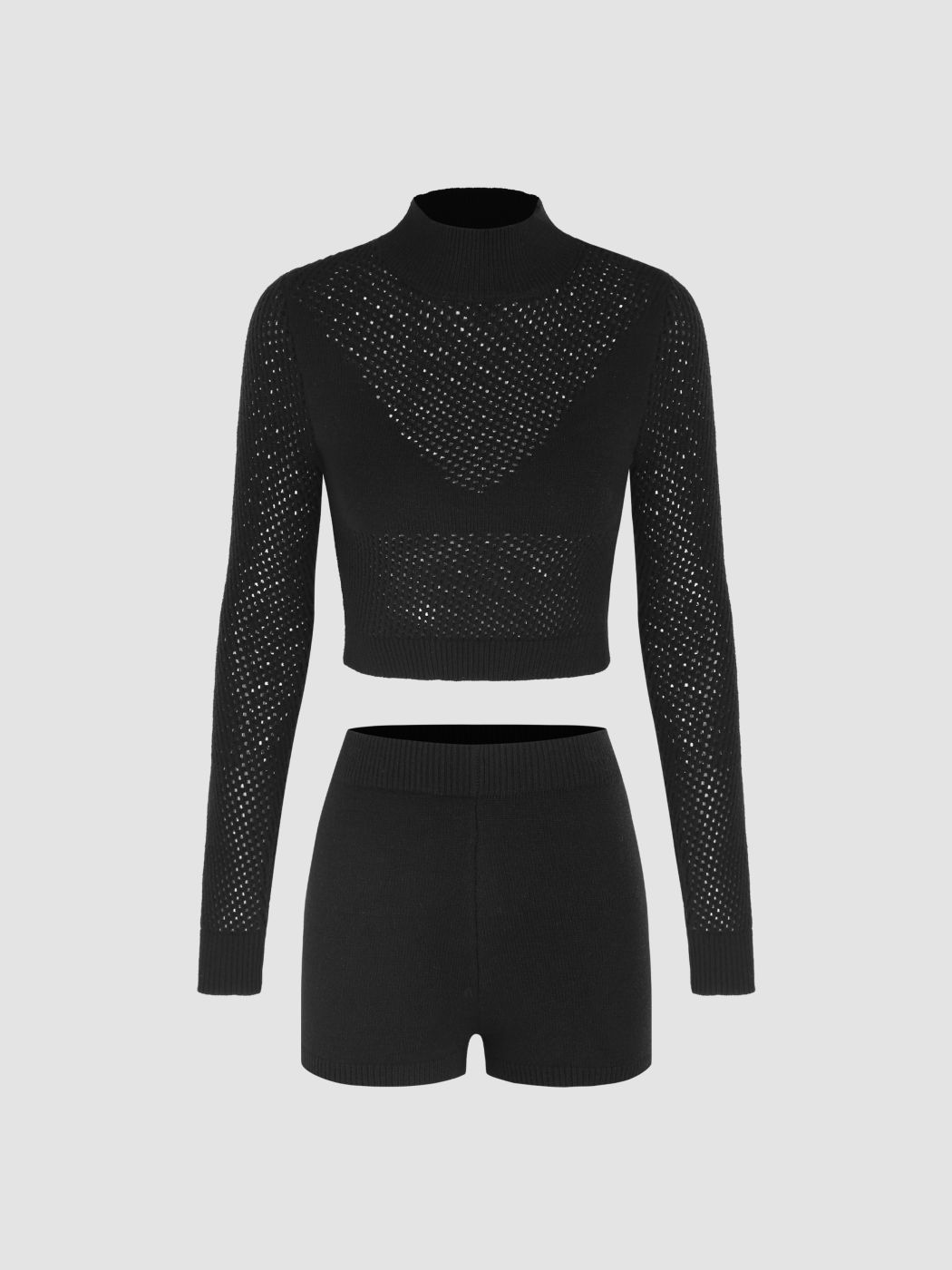 Set lavorato a maglia con top scavato a collo alto e pantaloncini legging a vita media