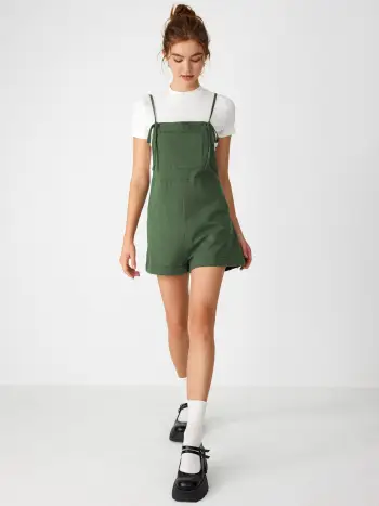 Pagliaccetto a gamba larga con tasca annodata