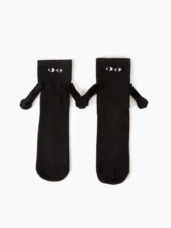 Magnetische Crew-Socken mit Augendekor und haltenden Händen