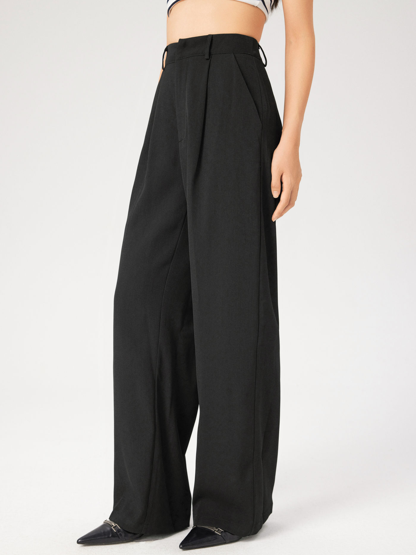 Pantalons droits à poches uni taille moyenne