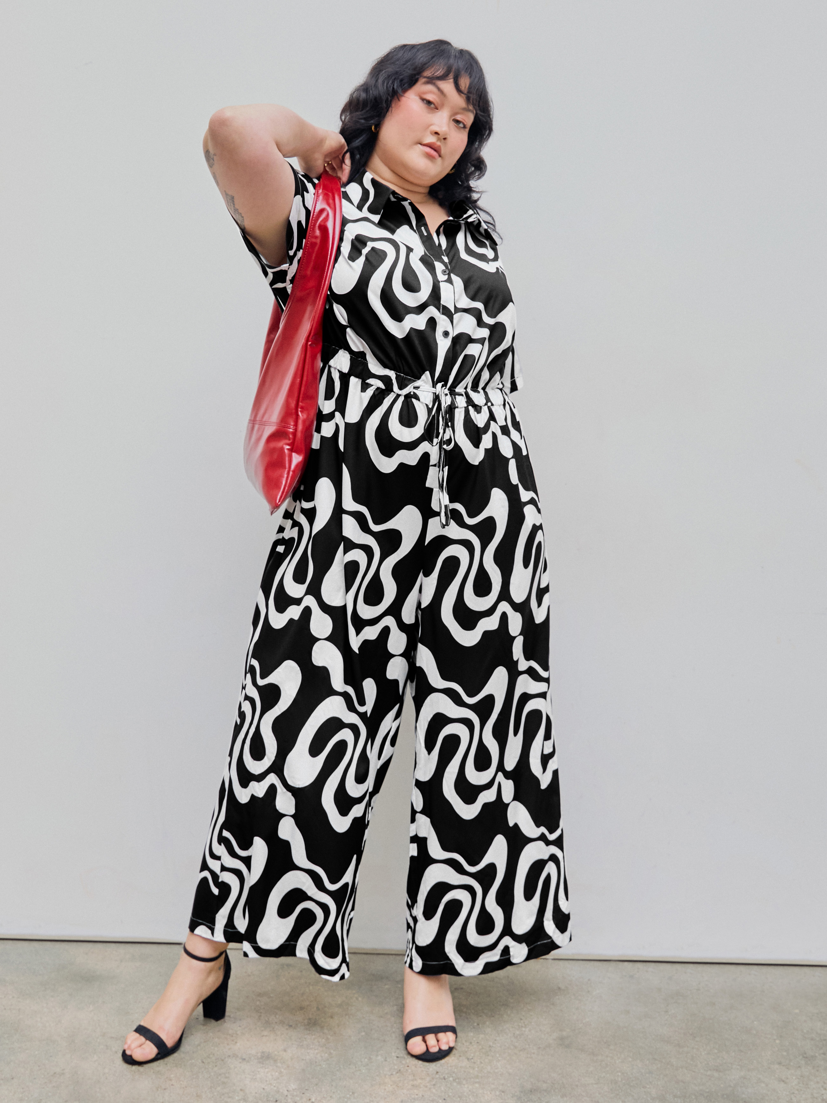 Plus size black and white jumpsuit on sale