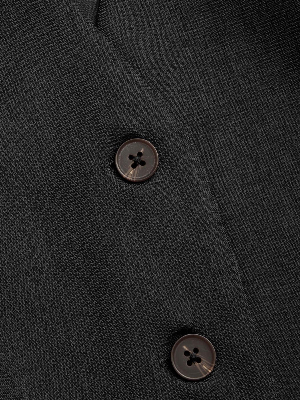 Gilet con bottoni solidi con scollo a V Curve & Plus