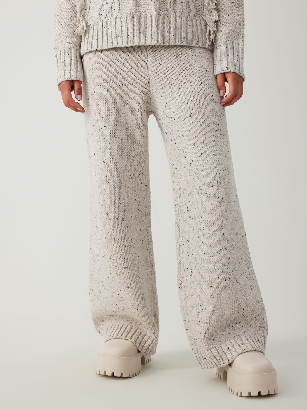 Pantaloni a gamba larga con vita elastica solida a vita media