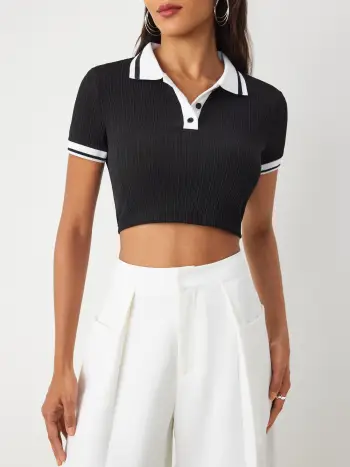 Top corto in polo con rilegatura a contrasto