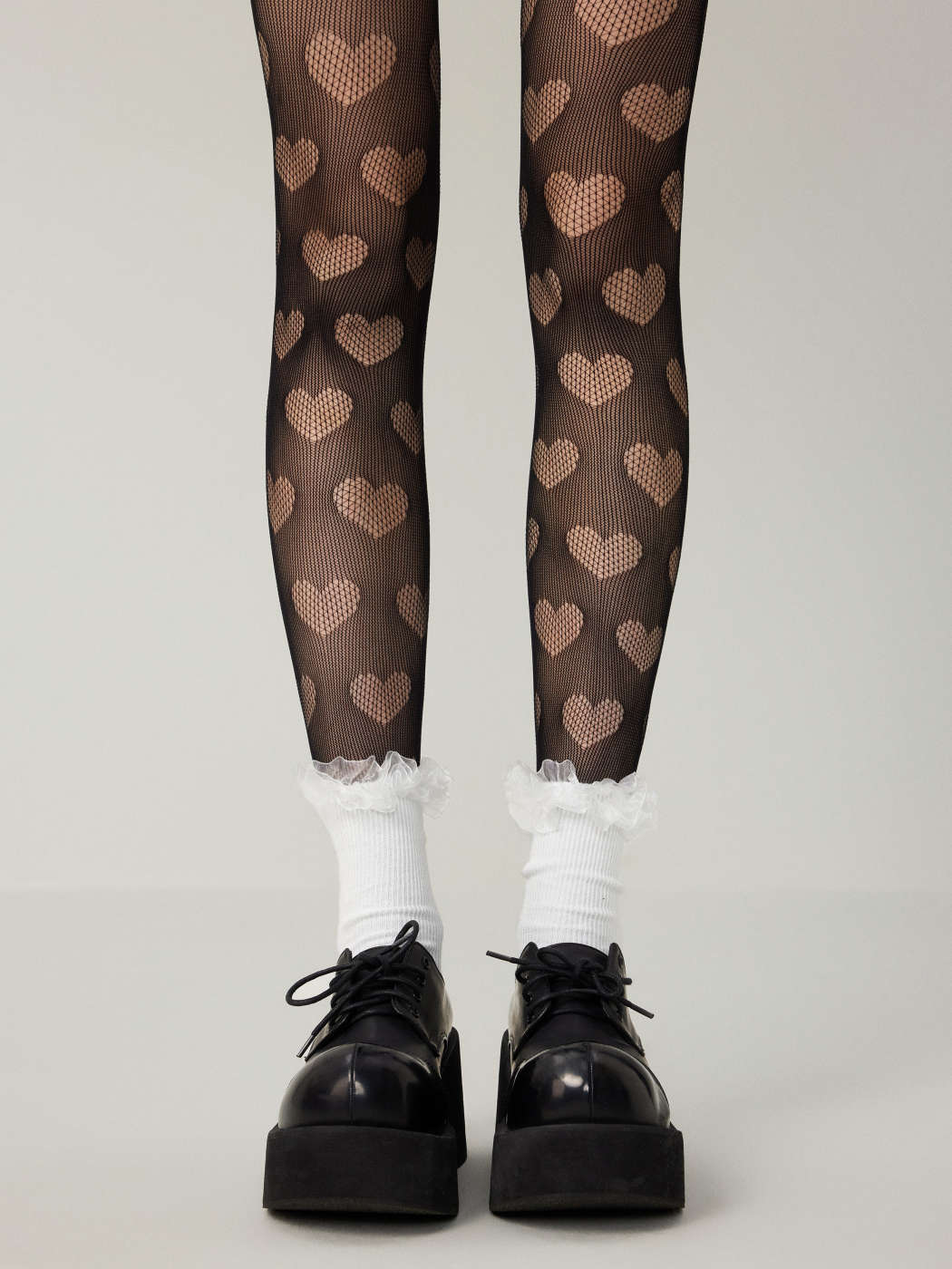 Tessuto Collant con decorazione a cuore