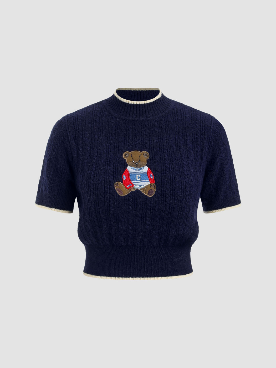Strickoberteil mit hohem Kragen und Bärengrafik Kurzarm
