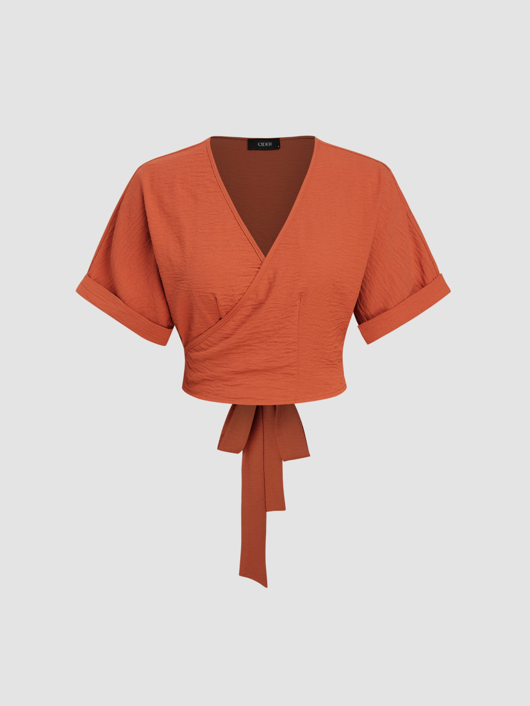 Top a manica corta con scollo a V e annodato
