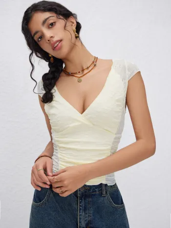 Crop Top in pizzo con scollo a V e maniche corte senza schienale