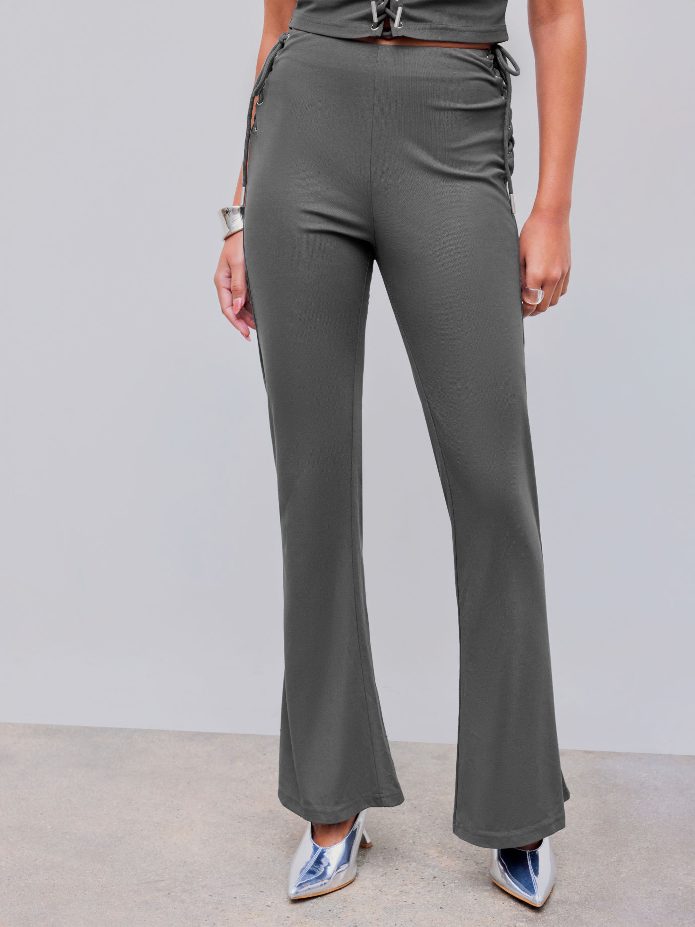 Pantalón acampanado de tiro bajo con cordones laterales Terry