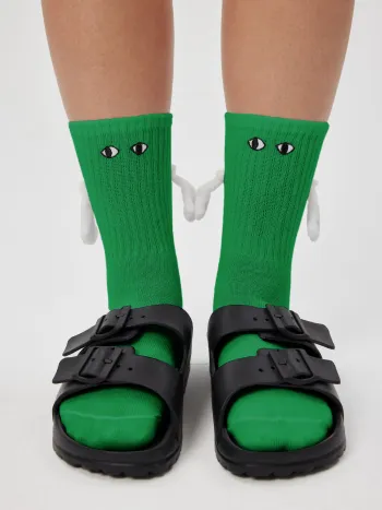 Magnetische Crew-Socken mit Augendekor und haltenden Händen