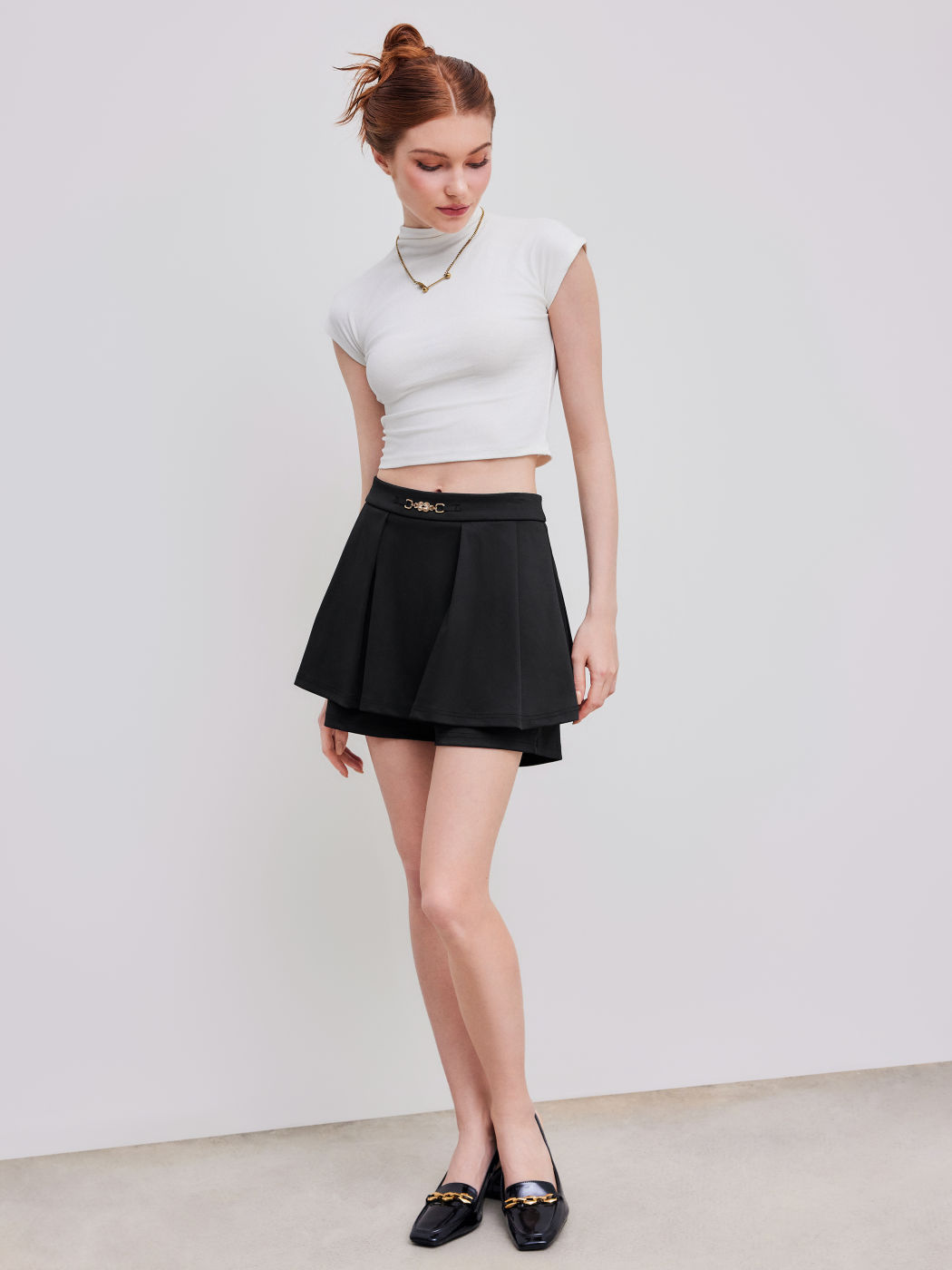 Einfarbiger Plissee-Skort mit mittlerer Taille