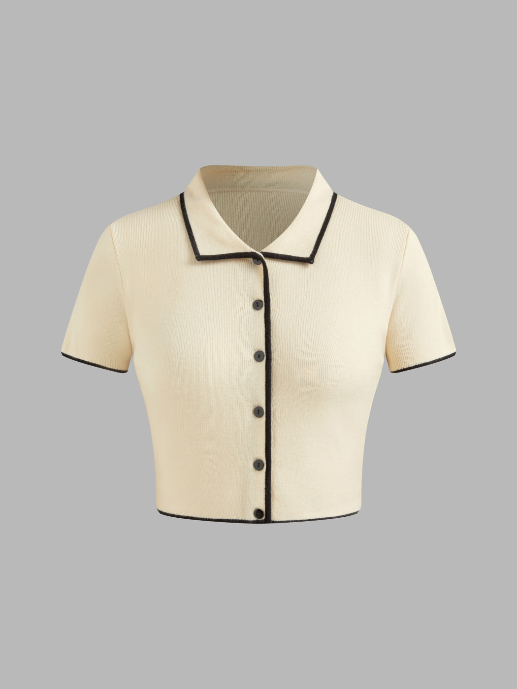 Polo in maglia con rilegatura a contrasto Top a maniche corte con minigonna a mezza vita con rilegatura a contrasto