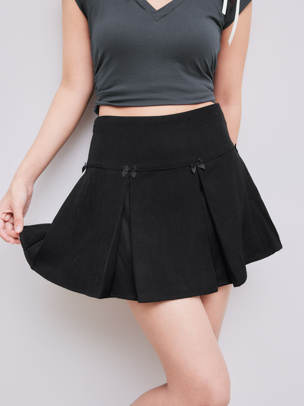 Plissiertes Mini-Skort mit Schleife