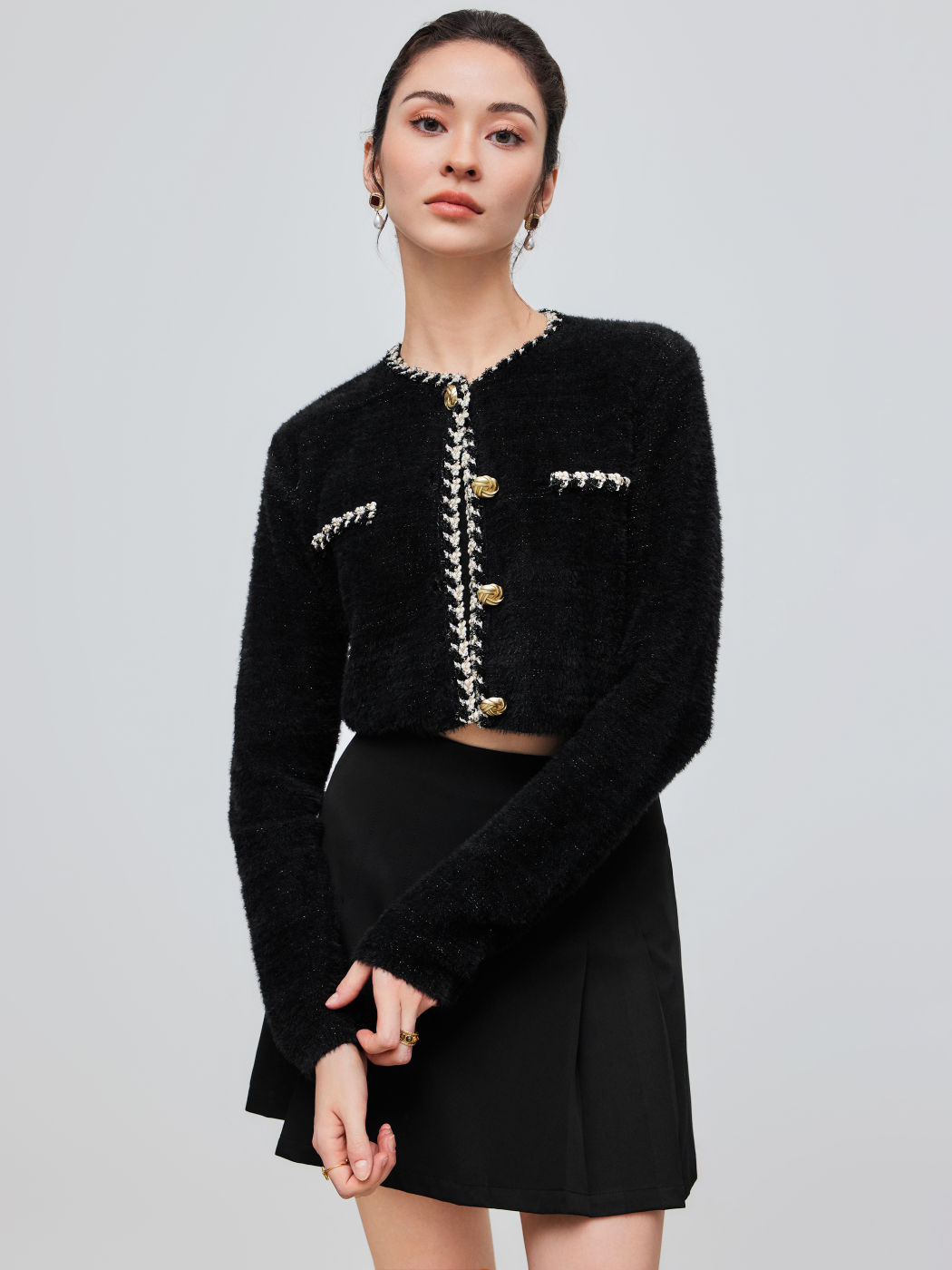 Cardigan in maglia con scollo rotondo e bottoni a contrasto