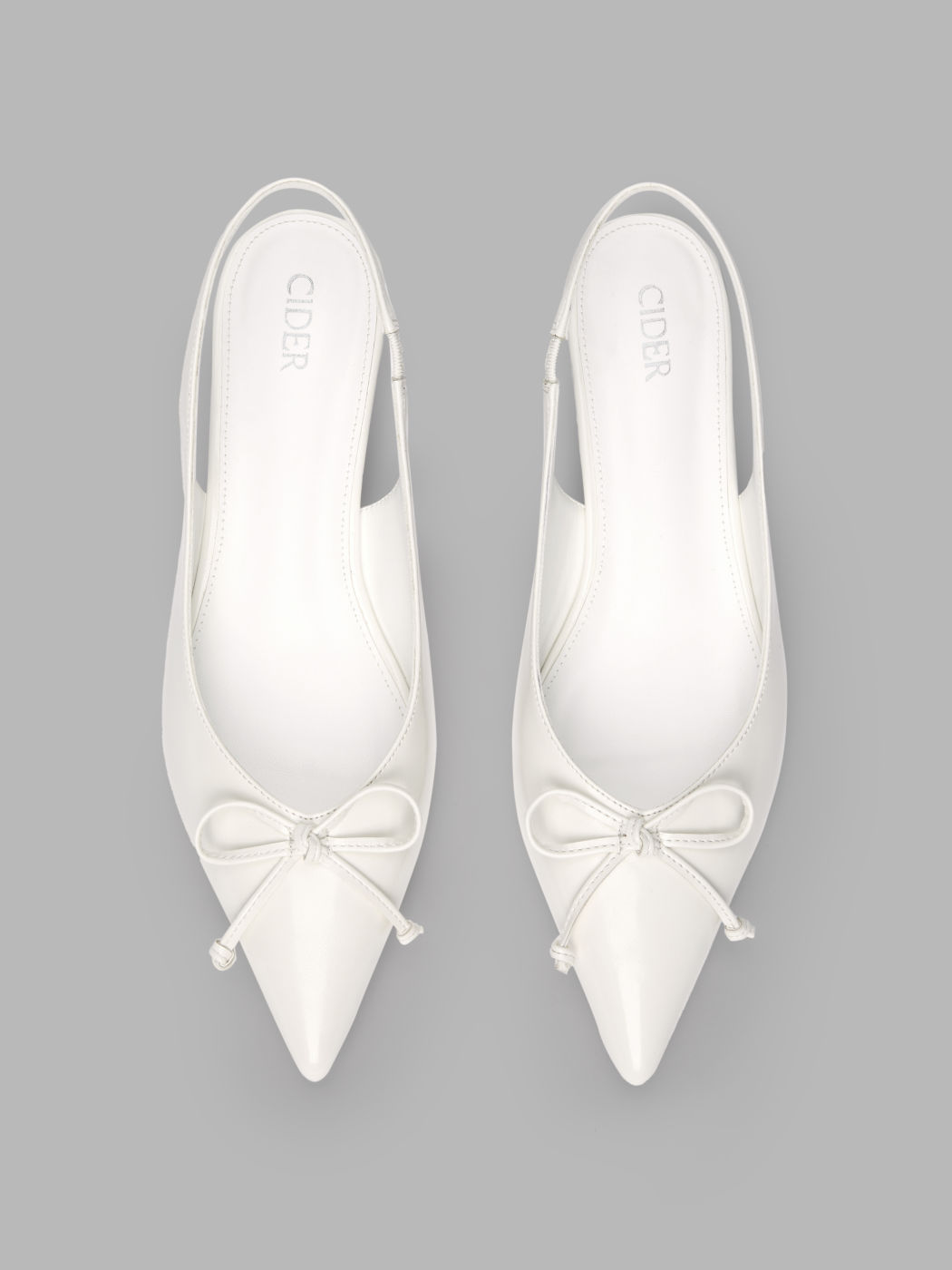 Schleifen Slingback-Absätze mit spitzer Zehe