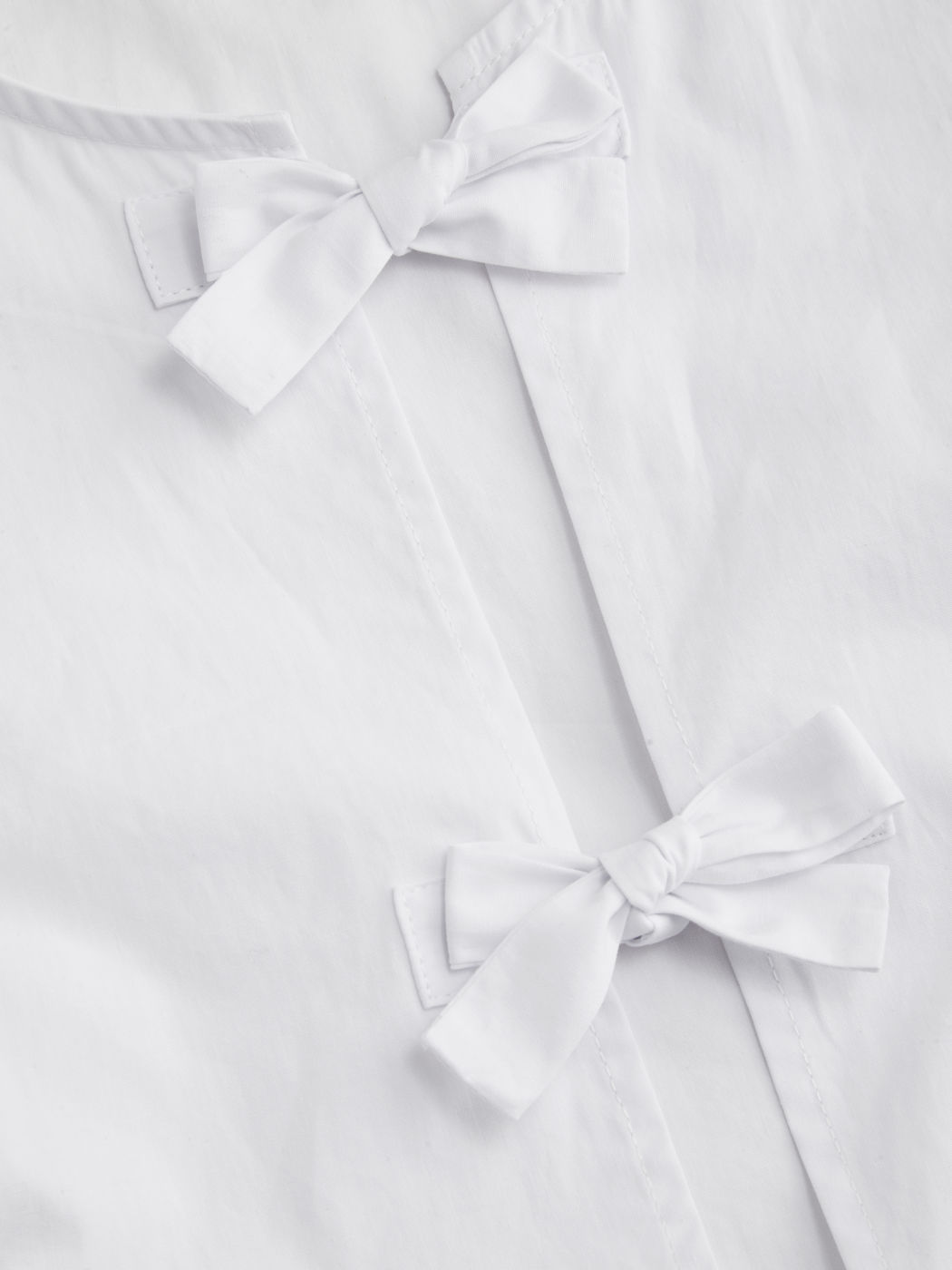 100% Cotton Round Neck Solid Bowknot Ruffle Hem Puff Sleeve Blouse