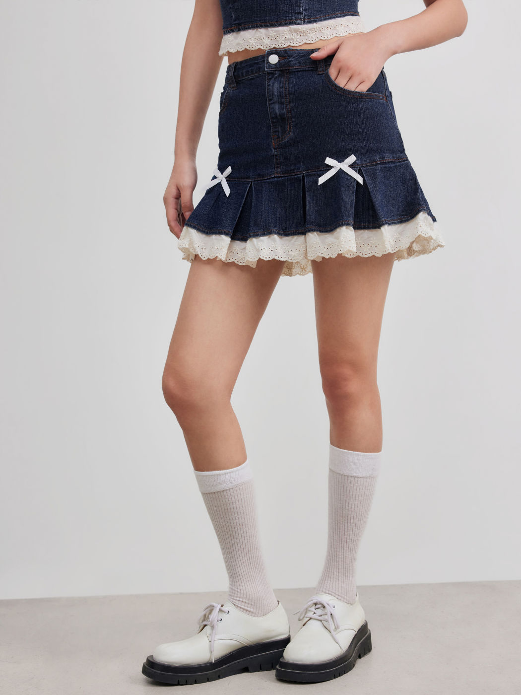 High Stretch Denim Mid Rise Broderie Anglaise Hem Bowknot Mini Skirt