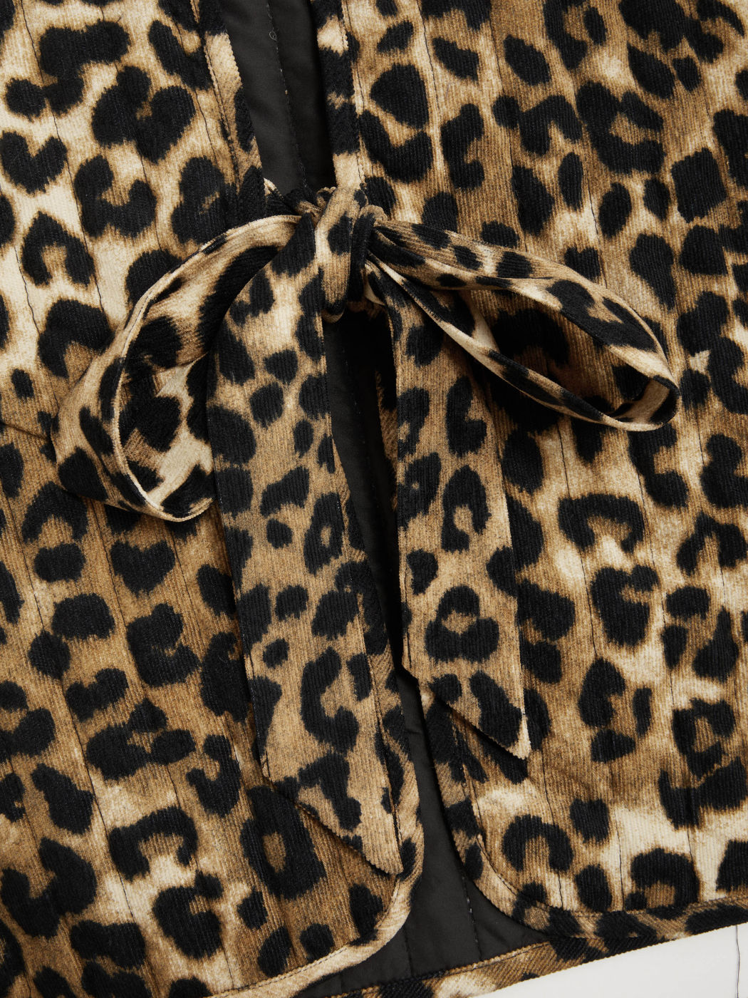 Gilet in velluto a coste leopardato con laccetti