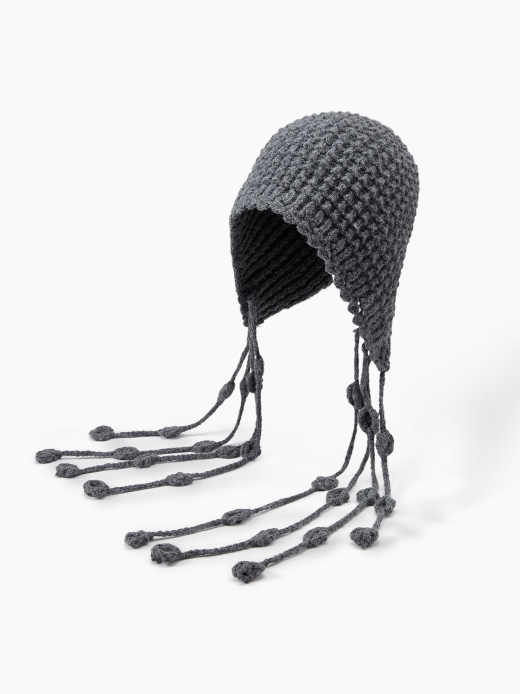 Strickmütze mit Tasseln
