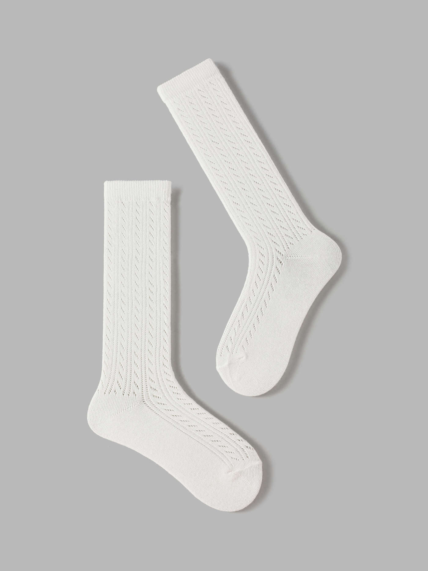 SOLID HOLLOW OUT OVER THE CALF SOCKS