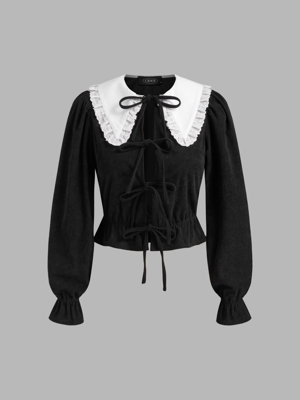 Camicetta a maniche lunghe in velluto a coste con colletto a contrasto e rifiniture in broderie anglaise