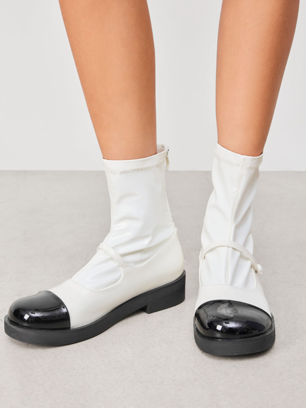 FRONT STRAP TWO-TONE ANKLE BOOTS