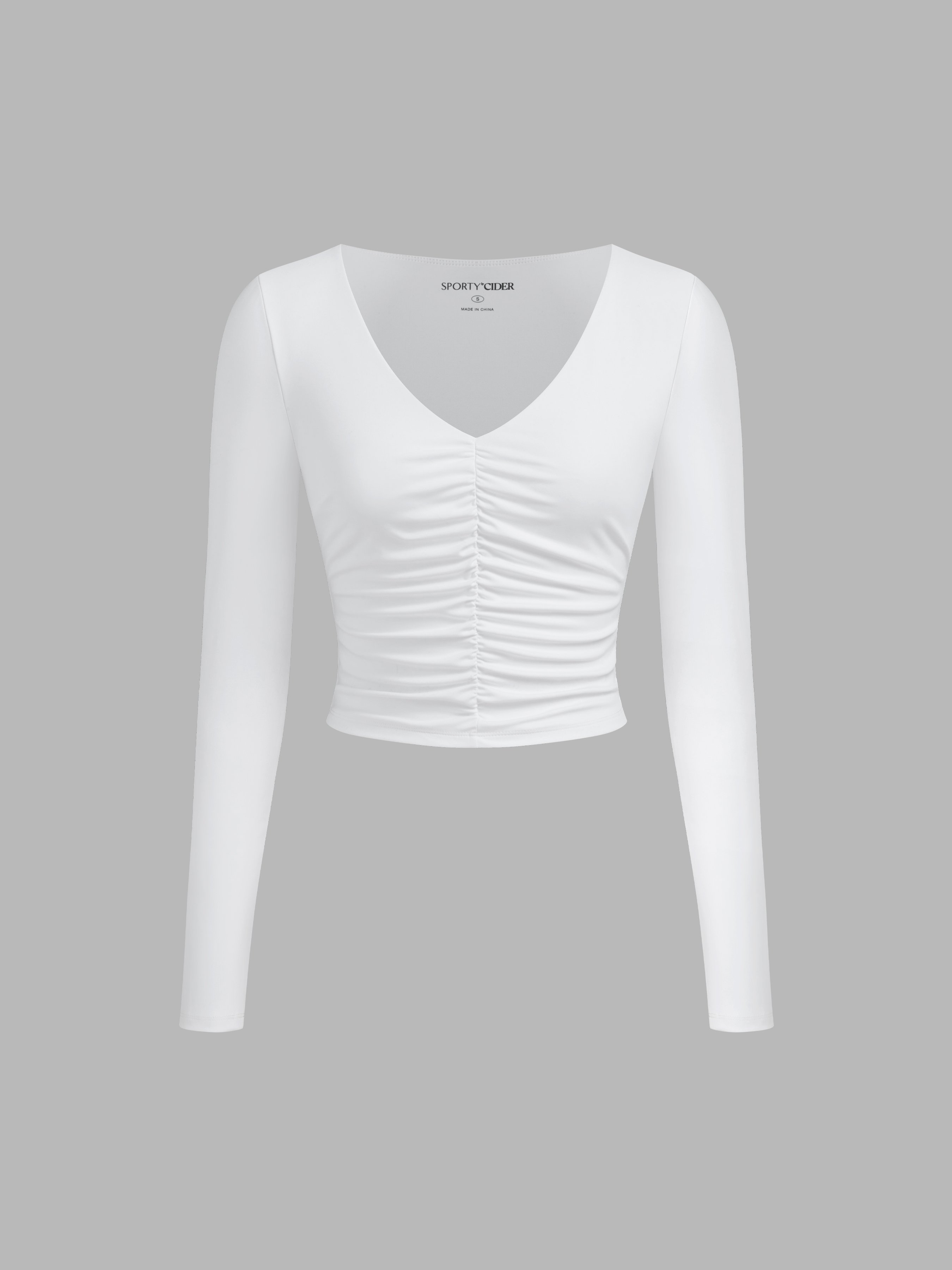 white ruched long sleeve top