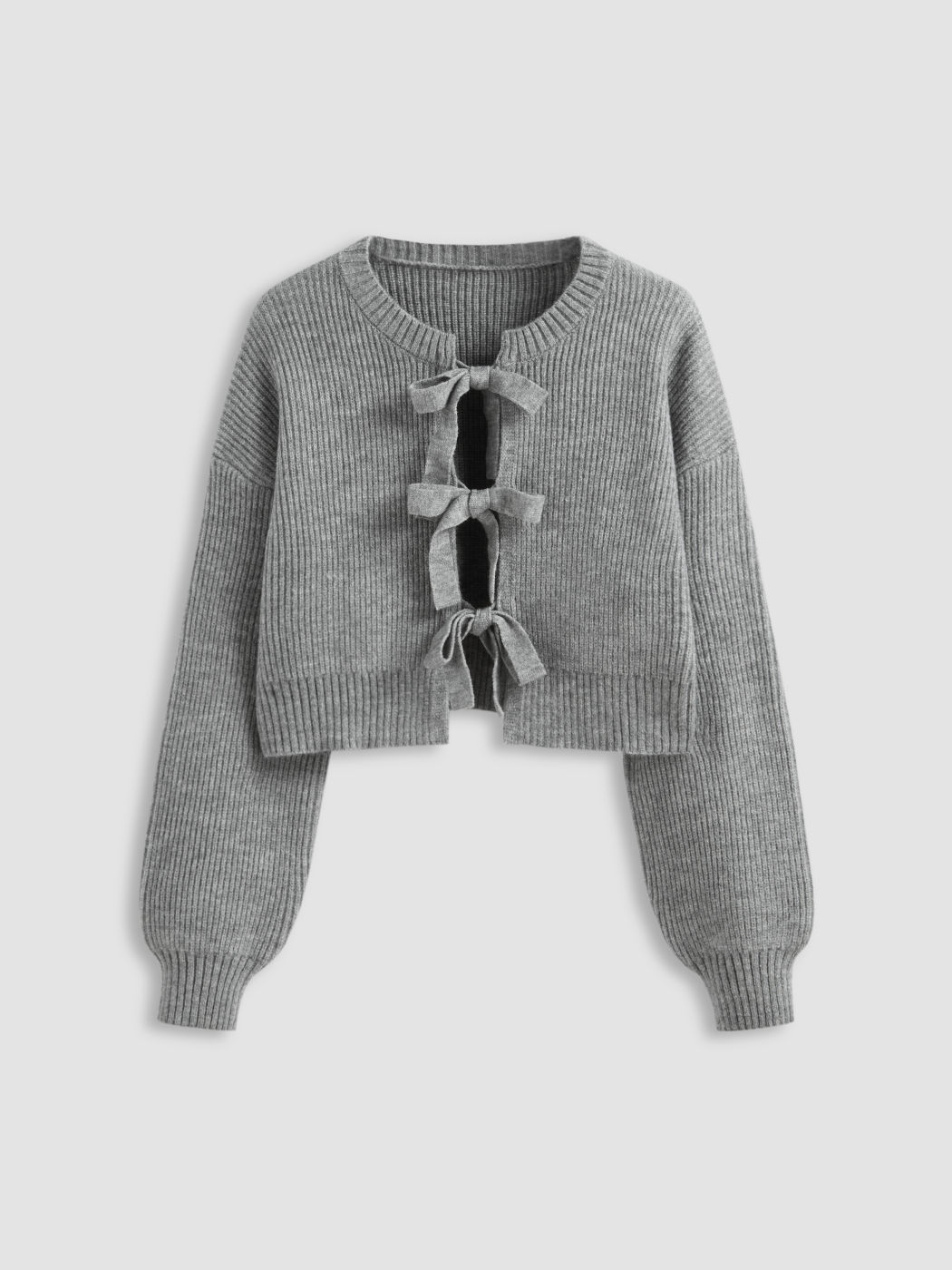 Strickjacke mit Rundhals, einfarbig und Bauschopf an der Front