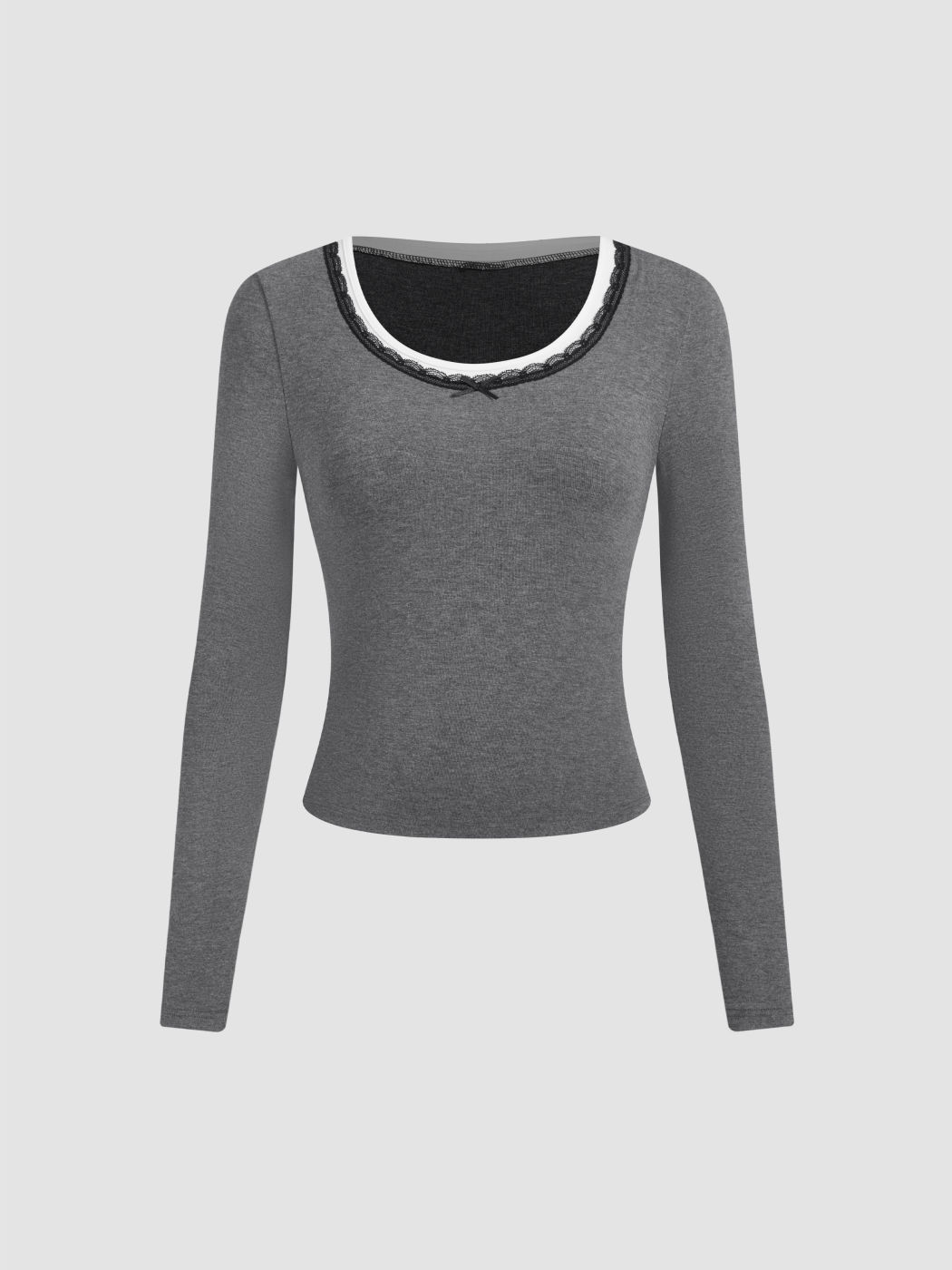 Top a manica lunga con scollo rotondo e bordatura in pizzo a contrasto