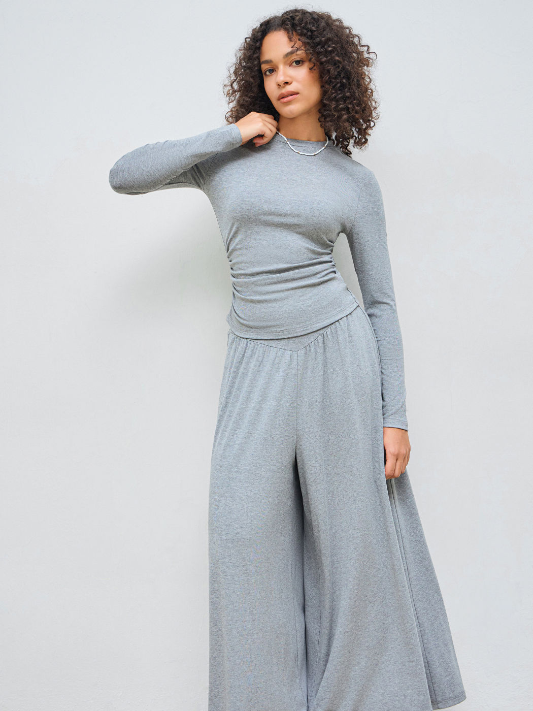 Round Neckline Solid Ruched Long Sleeve Top & Mid Rise Ruffle Hem Trousers Set
